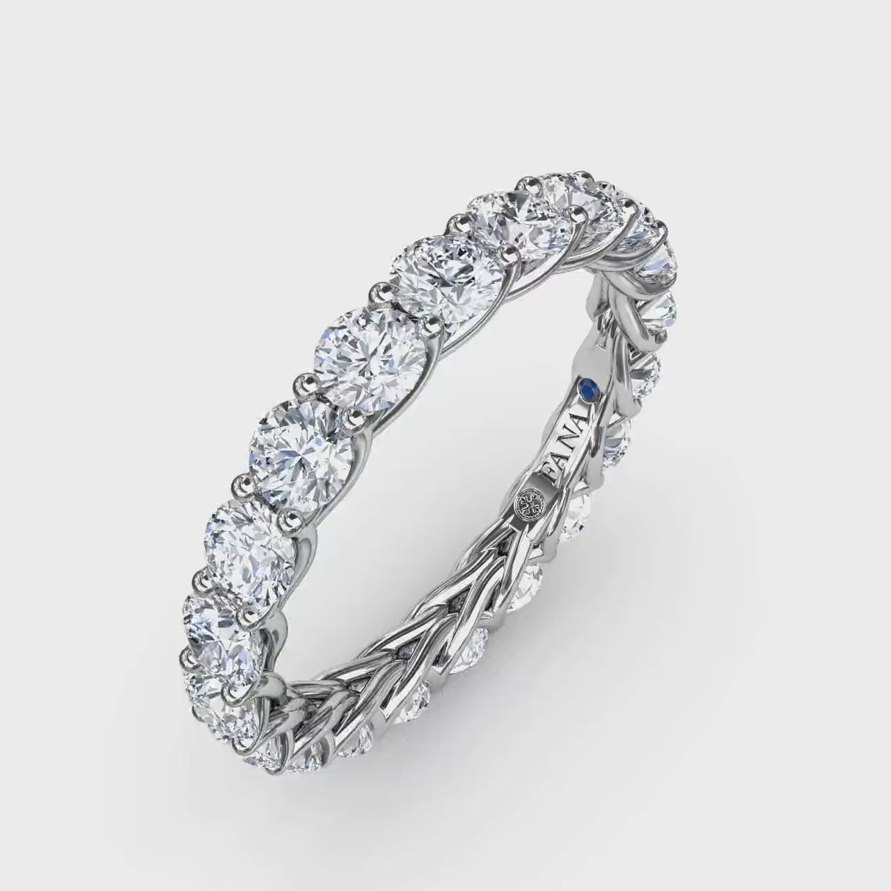 360 degree product video of the Fana W6137 14k white gold 2.54ct woven diamond eternity band, highlighting its structural side profile details and incredible full-circle sparkle at Noah's Fine Watches & Jewelry.