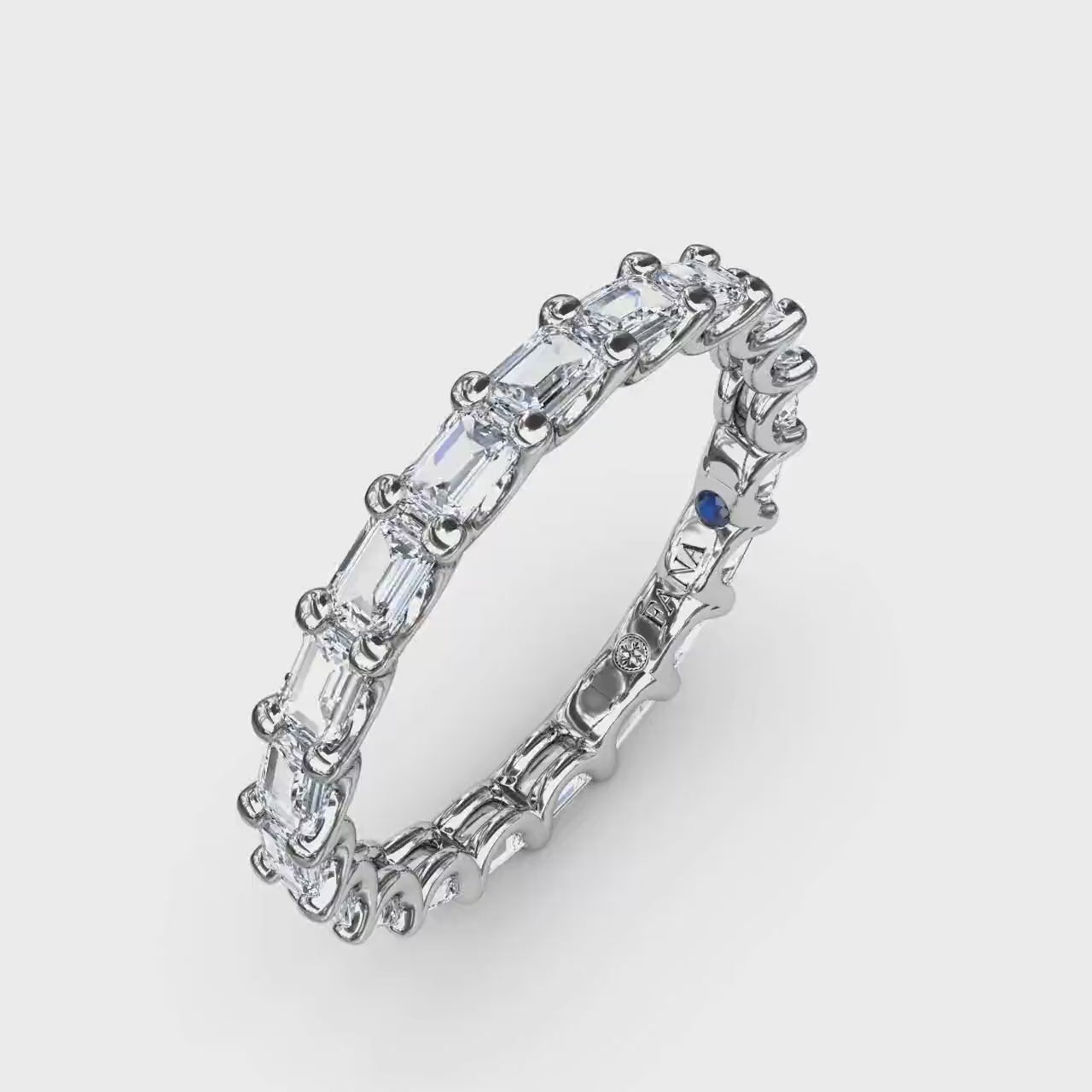 360 degree product video of the Fana W6142 14k white gold 1.59ct horizontal emerald cut diamond eternity band, showcasing its geometric low profile and mirror-like full-circle flash at Noah's Fine Watches & Jewelry