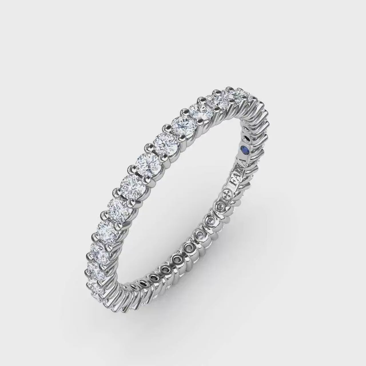360-degree product video of the Fana W6124 14k white gold contemporary diamond eternity band, displaying its slim profile, full-circle brilliance, and shared-prong setting at Noah's Fine Watches & Jewelry