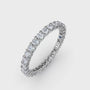 Angled side-view profile of the Fana W6125 white gold eternity band highlighting the polished metal prongs and side light galleries
