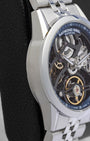 Left side profile view of the slim 10.8mm stainless steel case and faceted lugs on a Raymond Weil Freelancer watch