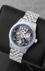 Angled view of a Raymond Weil Freelancer Skeleton watch with visual depth of the openworked mechanical movement