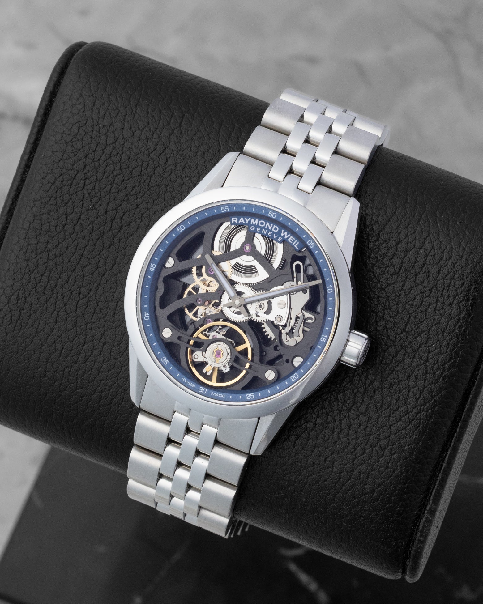 Angled view of a Raymond Weil Freelancer Skeleton watch with visual depth of the openworked mechanical movement