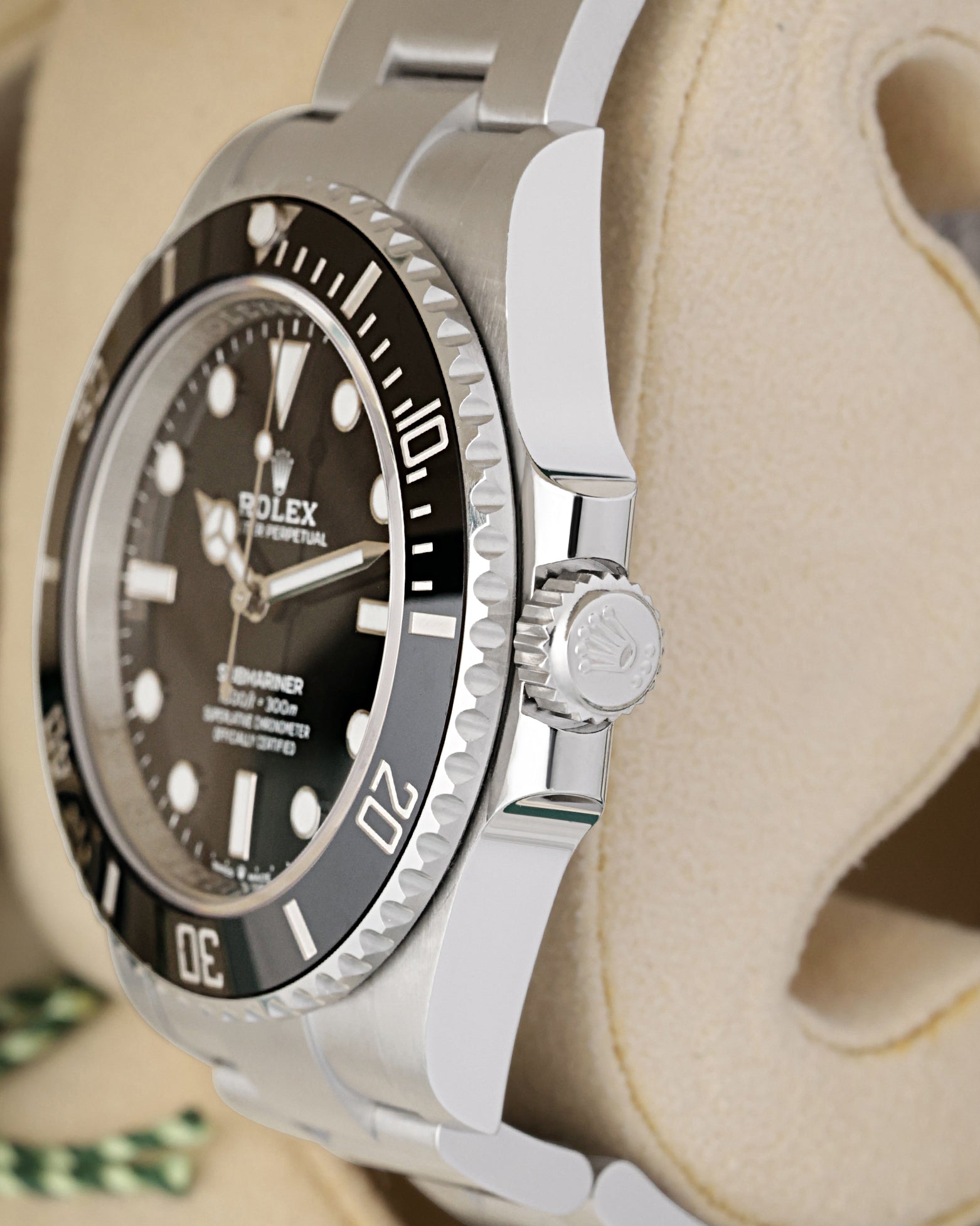 Side profile focus on the sleek 41mm luxury dive watch case architecture and the screw-down Triplock waterproof winding crown