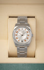 Pre-owned 2008 Rolex Air-King reference 114200 34mm with silver concentric dial and orange Arabic numerals at Noah's Fine Watches & Jewelry in Dallas, Texas