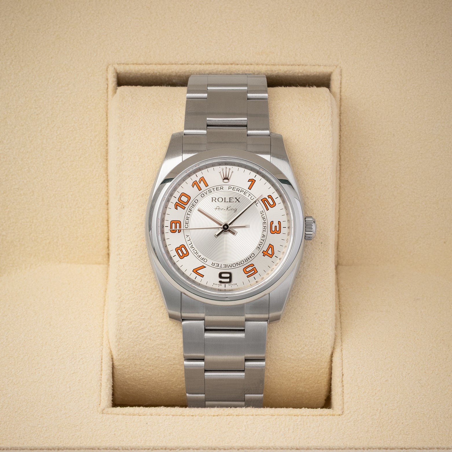 Pre-owned 2008 Rolex Air-King reference 114200 34mm with silver concentric dial and orange Arabic numerals at Noah's Fine Watches & Jewelry in Dallas, Texas