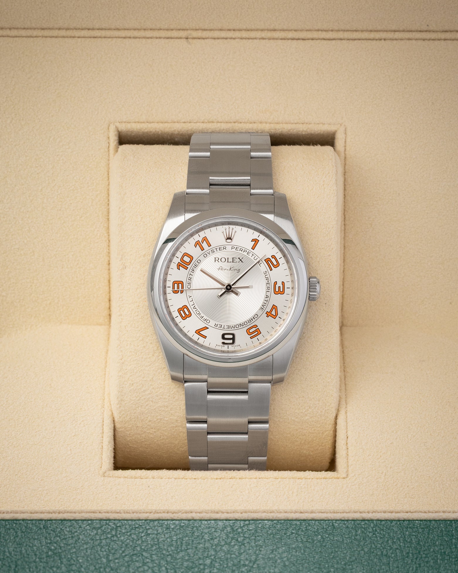 Pre-owned 2008 Rolex Air-King reference 114200 34mm with silver concentric dial and orange Arabic numerals at Noah's Fine Watches & Jewelry in Dallas, Texas