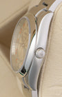 Side profile view showing the stainless steel smooth bezel, winding crown, and case of a Rolex Air-King 114200
