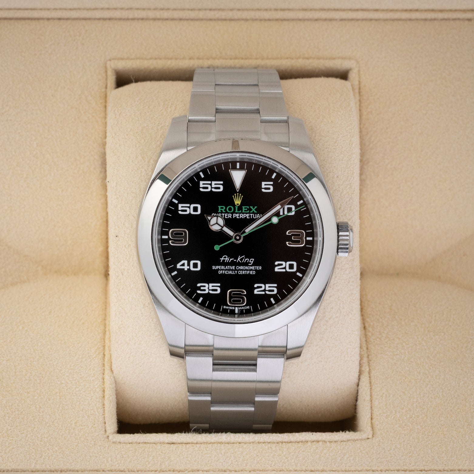 Rolex Air-King 40 reference 116900 stainless steel luxury watch featuring a black dial with green accents, resting inside its presentation box