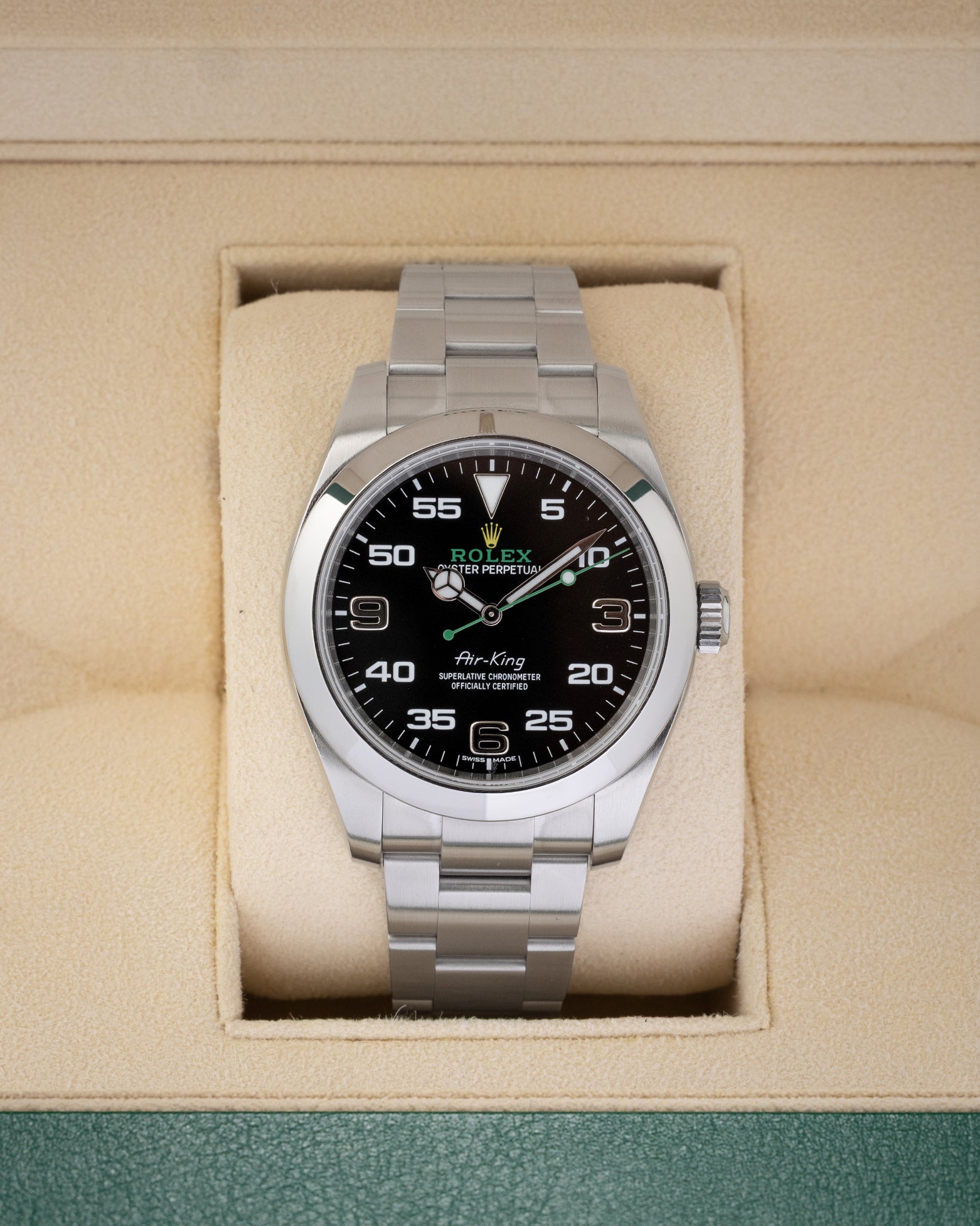 Rolex Air-King 40 reference 116900 stainless steel luxury watch featuring a black dial with green accents, resting inside its presentation box