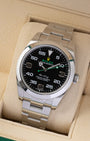 Angled view of the Rolex Air-King 40mm 116900 showing the black dial, green second hand, and stainless steel Oyster bracelet