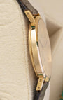 Polished 18k yellow gold case side profile of a vintage pre-owned Rolex Cellini reference 4112