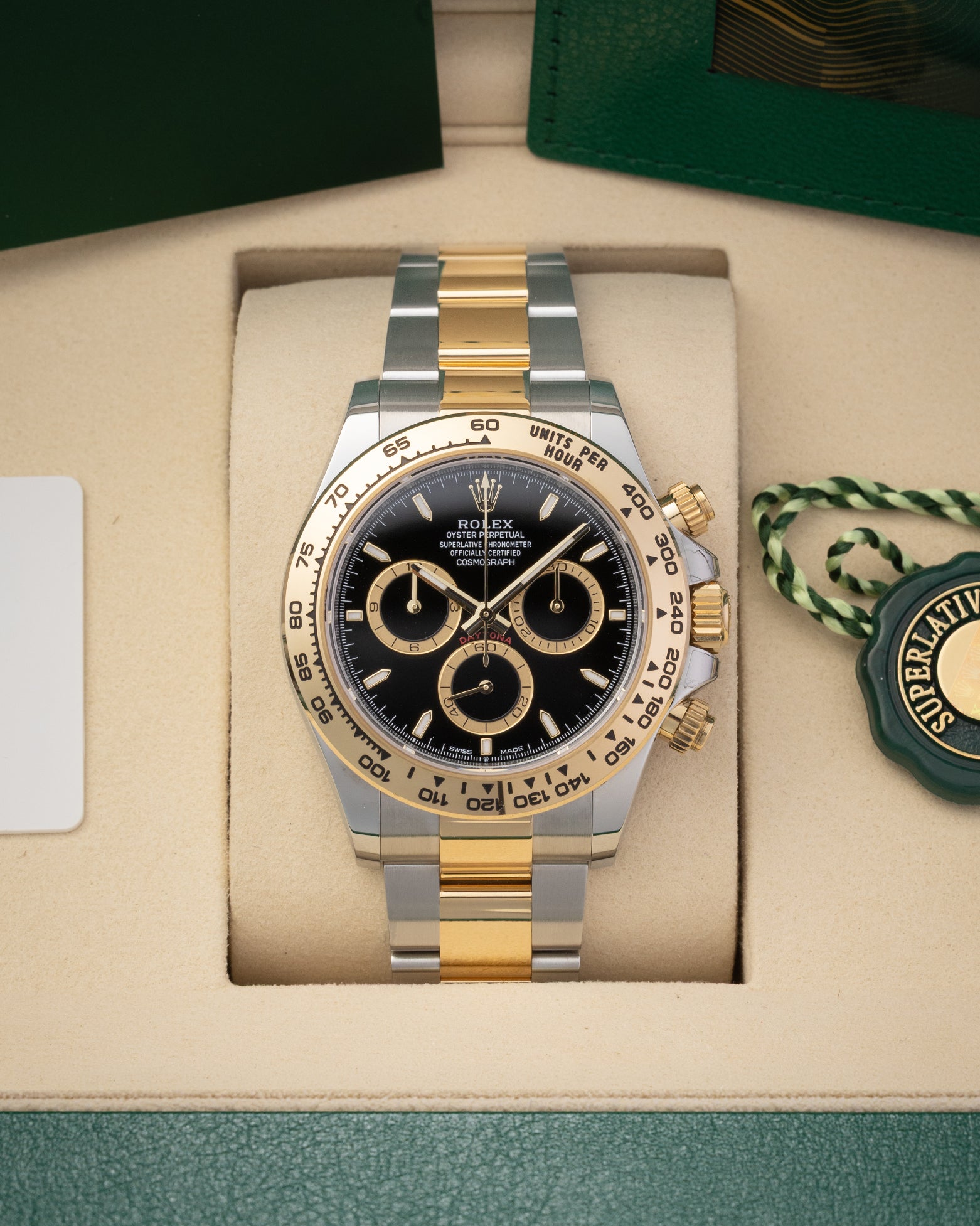 Pre owned 2026 Rolex Cosmograph Daytona 126503 two-tone Yellow Rolesor watch with black dial in display box at Noah's Fine Watches & Jewelry in Dallas, Texas