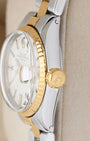 Side profile view of a vintage two-tone Rolex 6517 showing the yellow gold fluted bezel and signed fluted gold screw-down crown