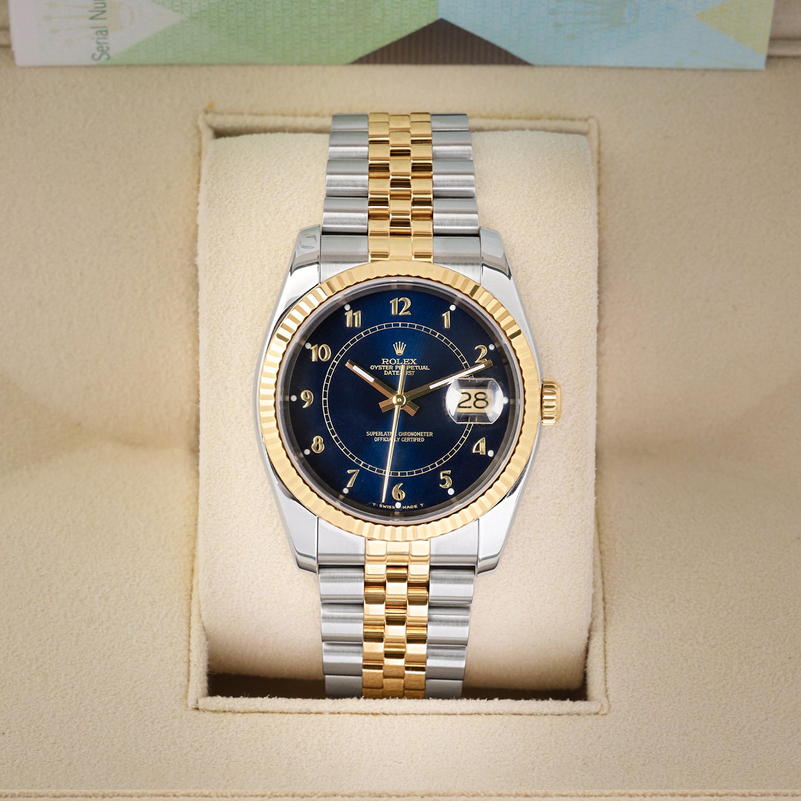 Front view of a pre-owned 2006 Rolex Datejust 36 Ref 116233 featuring an aftermarket blue boiler gauge dial with gold Arabic numerals, available at Noahs Fine Watches and Jewelry Dallas