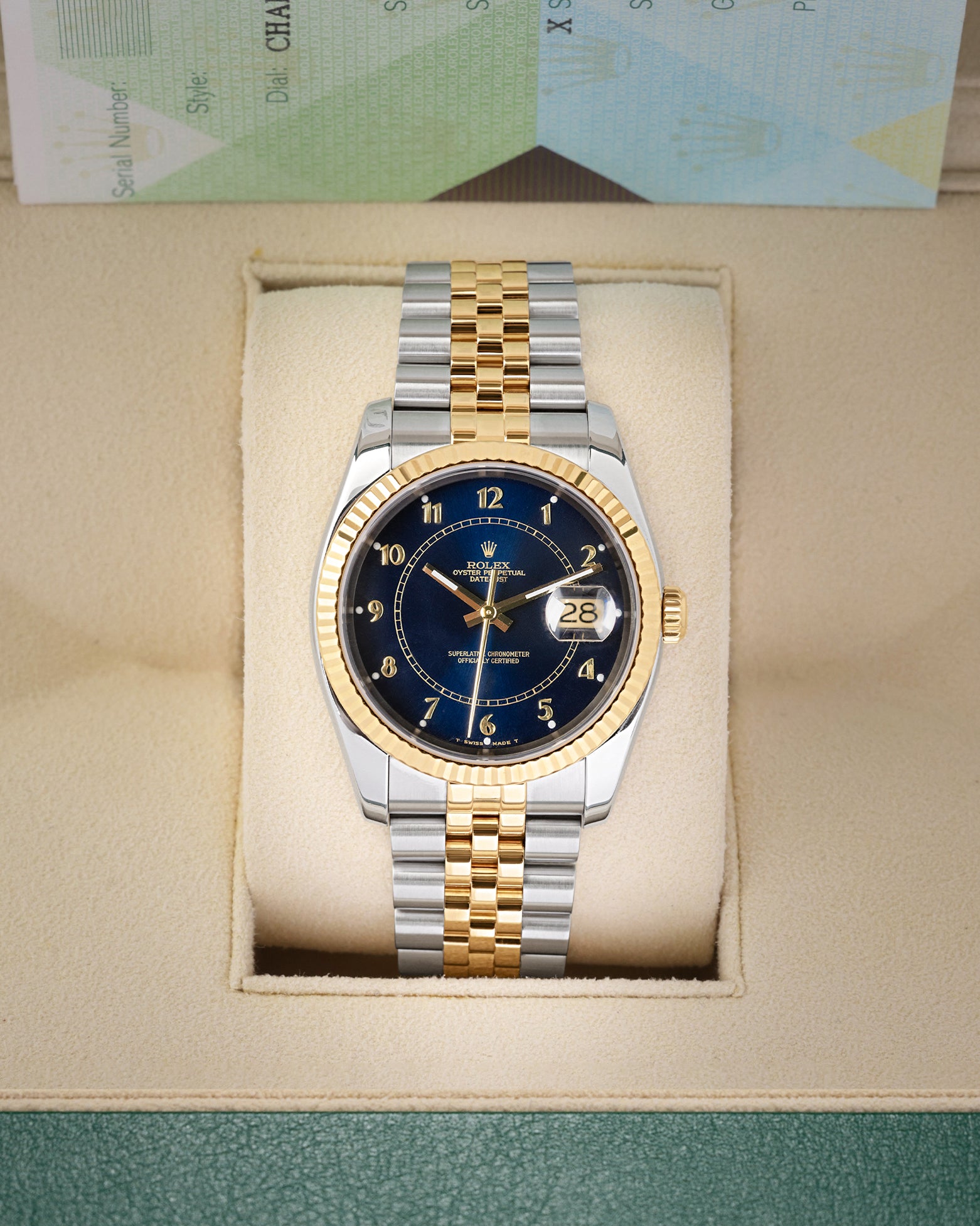 Front view of a pre-owned 2006 Rolex Datejust 36 Ref 116233 featuring an aftermarket blue boiler gauge dial with gold Arabic numerals, available at Noahs Fine Watches and Jewelry Dallas
