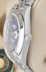 Side profile view of a stainless steel Rolex 126300 case showing the polished smooth bezel and signed Twinlock screw-down crown