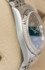 Left-side macro profile view showcasing the mirror-polished finish across the Oystersteel case band flank and the iconic tapered silhouette of the integrated professional lugs