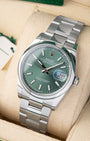 angled profile view of a pre-owned 2024 Rolex Datejust 36 reference 126200 showcasing the mint green index dial and stainless steel Oyster bracelet