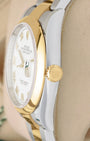 Side view close-up of the 18k yellow gold Twinlock screw-down crown and smooth domed bezel on Rolex Datejust 126203