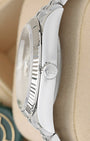 Close-up side view of the Twinlock screw-down crown and fluted bezel on a Rolex Datejust 36 126234