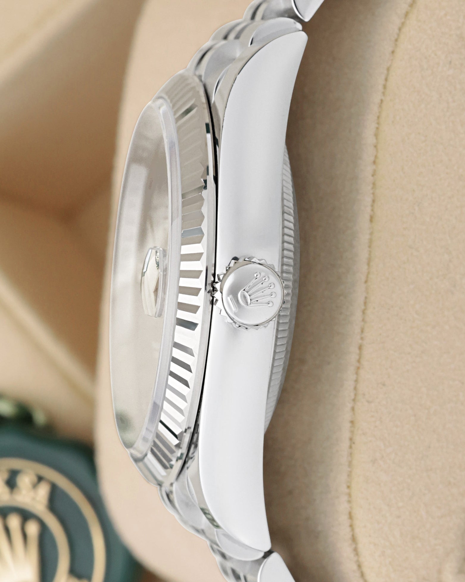 Close-up side view of the Twinlock screw-down crown and fluted bezel on a Rolex Datejust 36 126234
