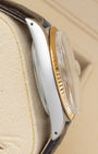 Left side profile view showing the stainless steel case with visible lug holes on a 1986 vintage Rolex Datejust reference 16013.