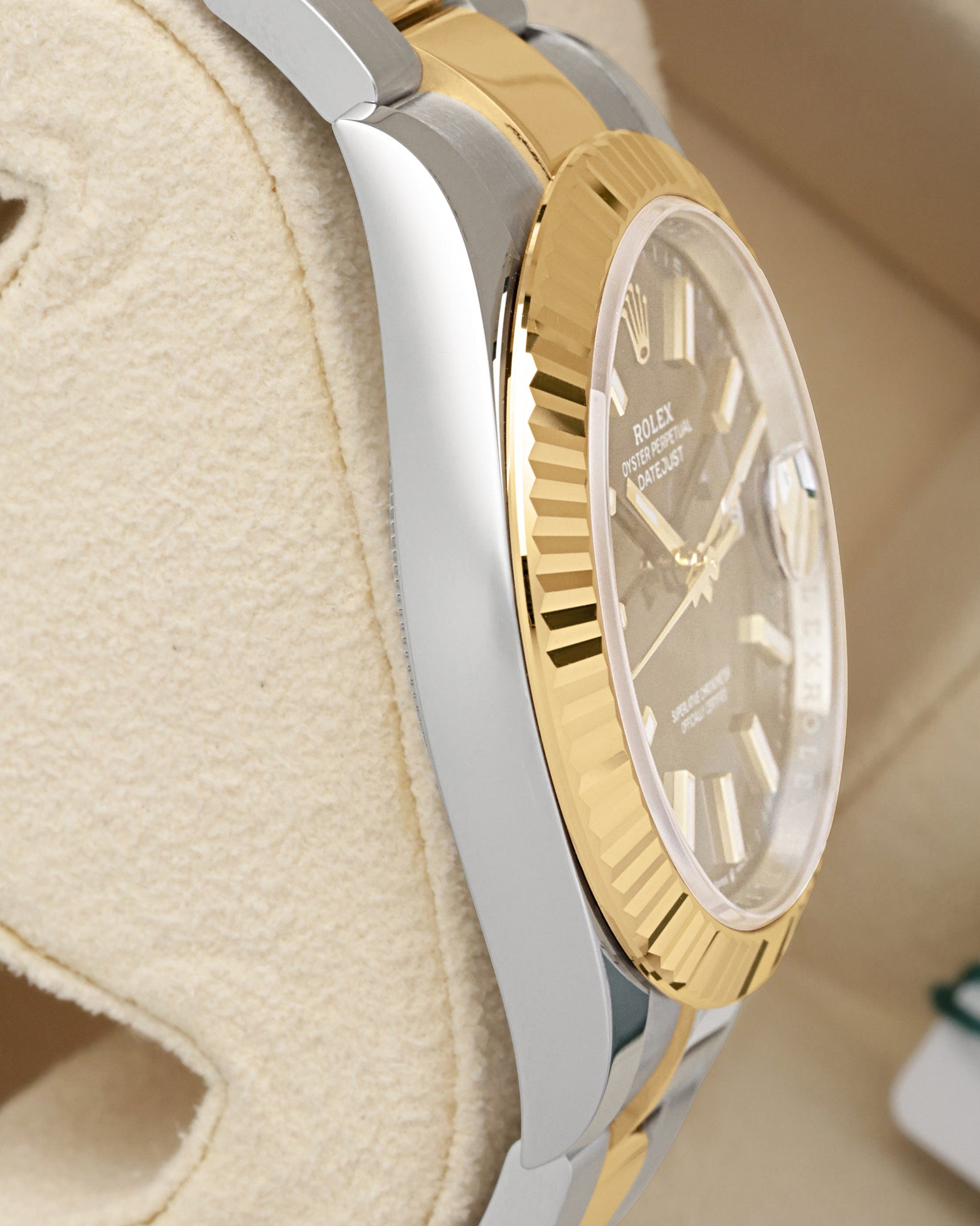 Side profile view of the 41mm Oystersteel case and yellow gold fluted bezel on reference 126333
