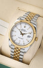 angled profile view of a pre-owned two-tone Rolex Datejust 41 reference 126333 showcasing gold index hour markers and a fluted bezel