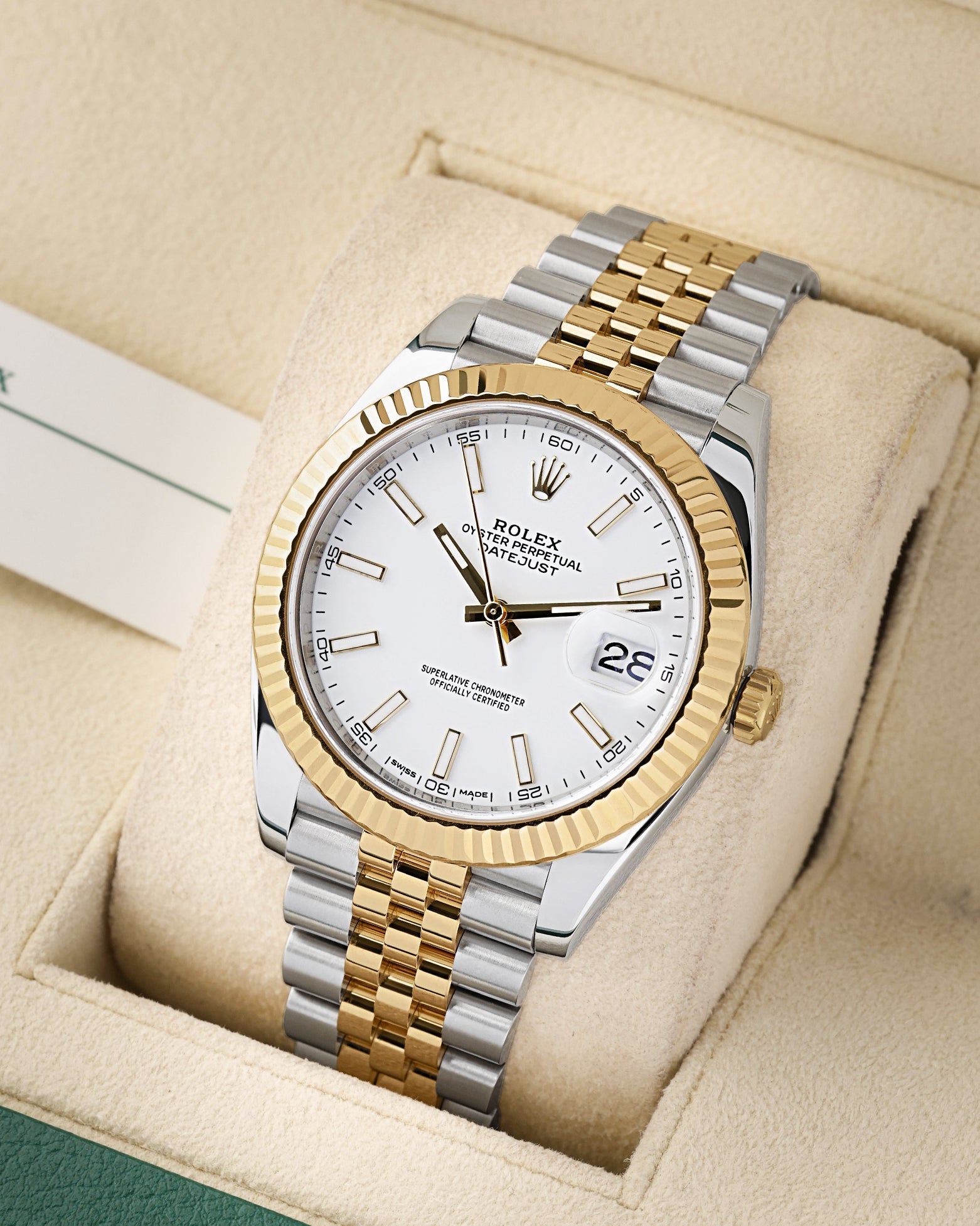 angled profile view of a pre-owned two-tone Rolex Datejust 41 reference 126333 showcasing gold index hour markers and a fluted bezel