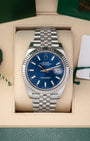 Pre owned 2023 Rolex Datejust 41 126334 blue dial with fluted bezel and Jubilee bracelet in box set at Noah's Fine Watches Dallas