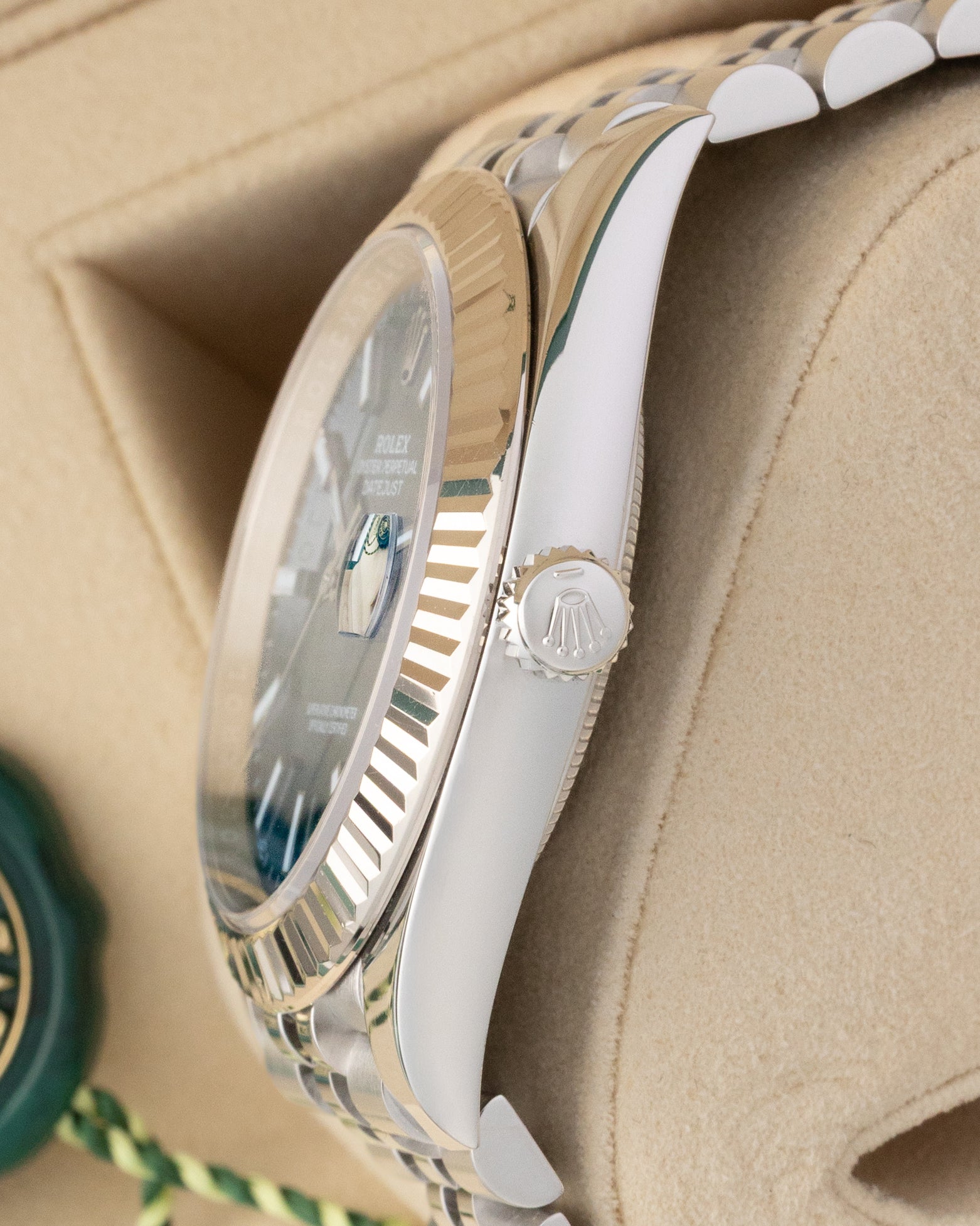 Side profile view of Rolex Datejust 41 126334 stainless steel case showing the winding crown