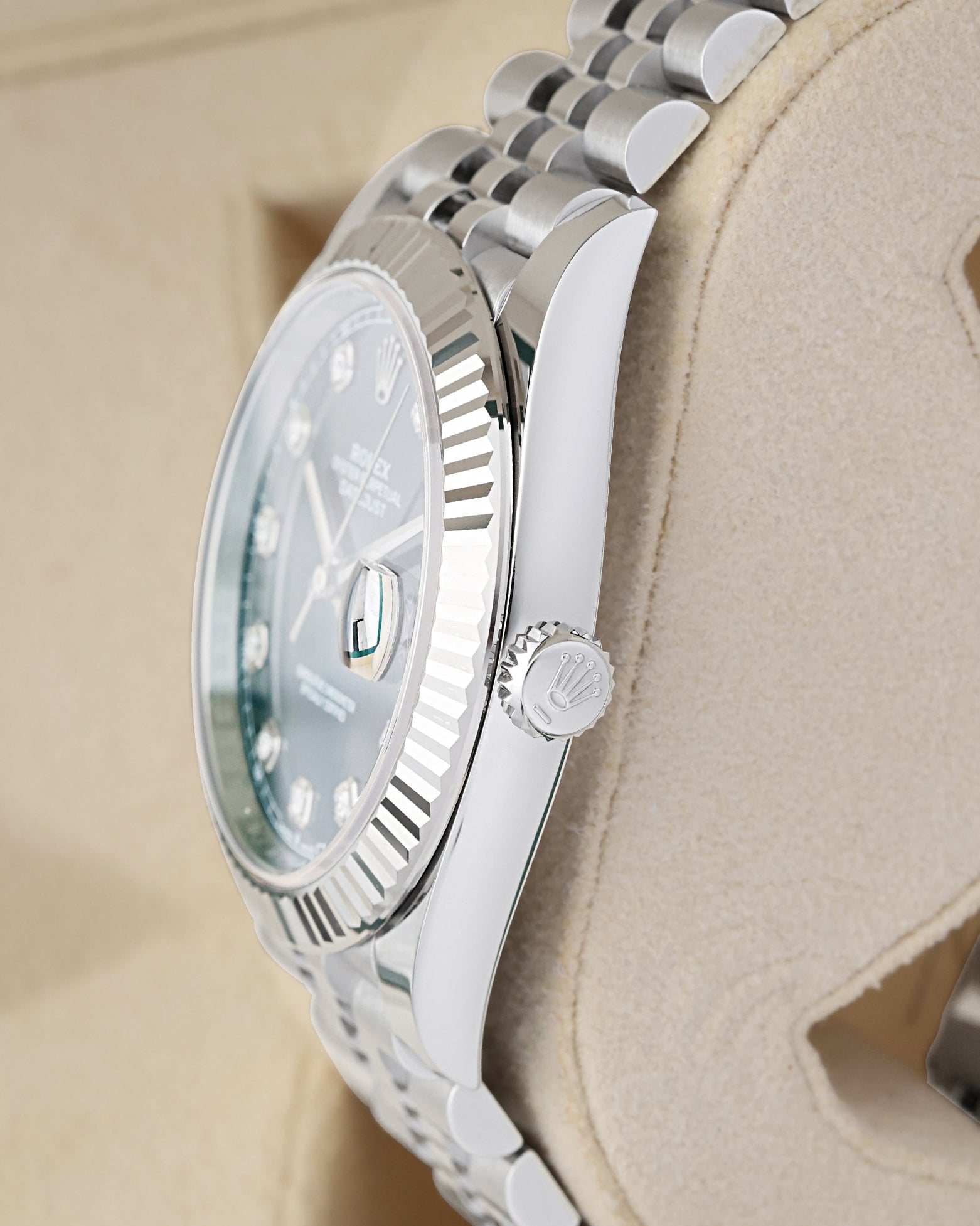 Right side profile view highlighting the polished steel case finish, winding crown, and Jubilee link integration on a Rolex Datejust 41