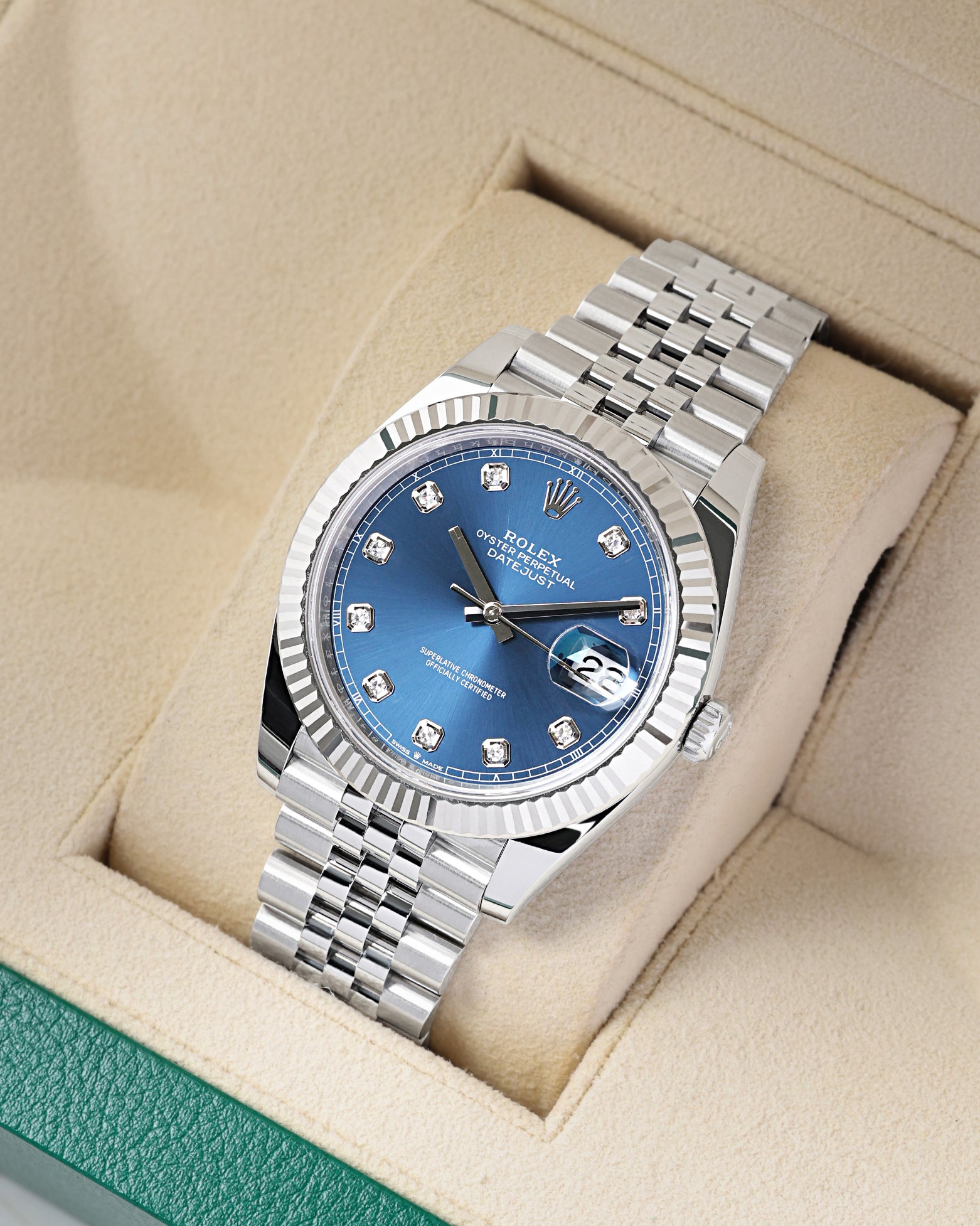 Front angled view of an Oystersteel Rolex Datejust 41 featuring an 18k white gold fluted bezel and Jubilee bracelet in Dallas