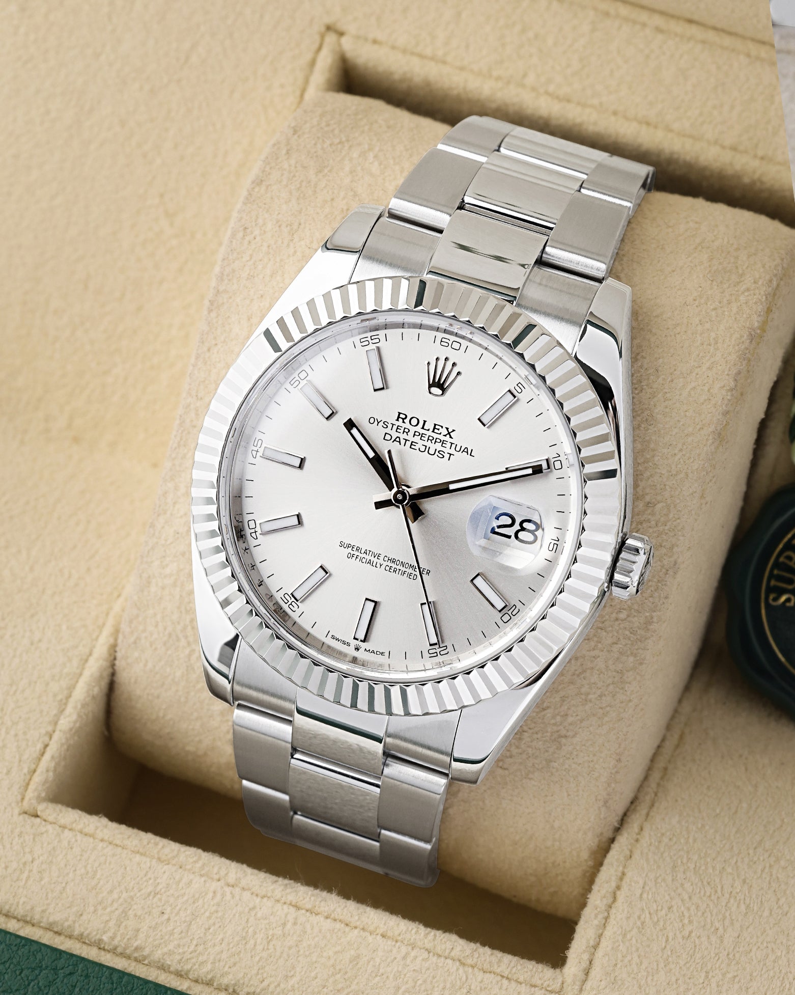 Angled collector view of a 41mm White Rolesor Rolex Datejust ref 126334 highlighting the polished steel case silhouette and matching three-link Oyster bracelet