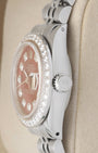 Side profile view of a vintage Rolex Lady-Datejust 6917 showing the diamond bezel edge and signed fluted screw-down crown
