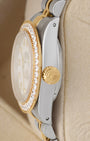 Side profile view of a two-tone Rolex Lady-Datejust 69173 showing the custom yellow gold diamond bezel and signed fluted gold crown
