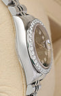 Left-side macro profile view showcasing the mirror-polished finish across the Oystersteel case band flank and the elegant tapered silhouette of the integrated lugs