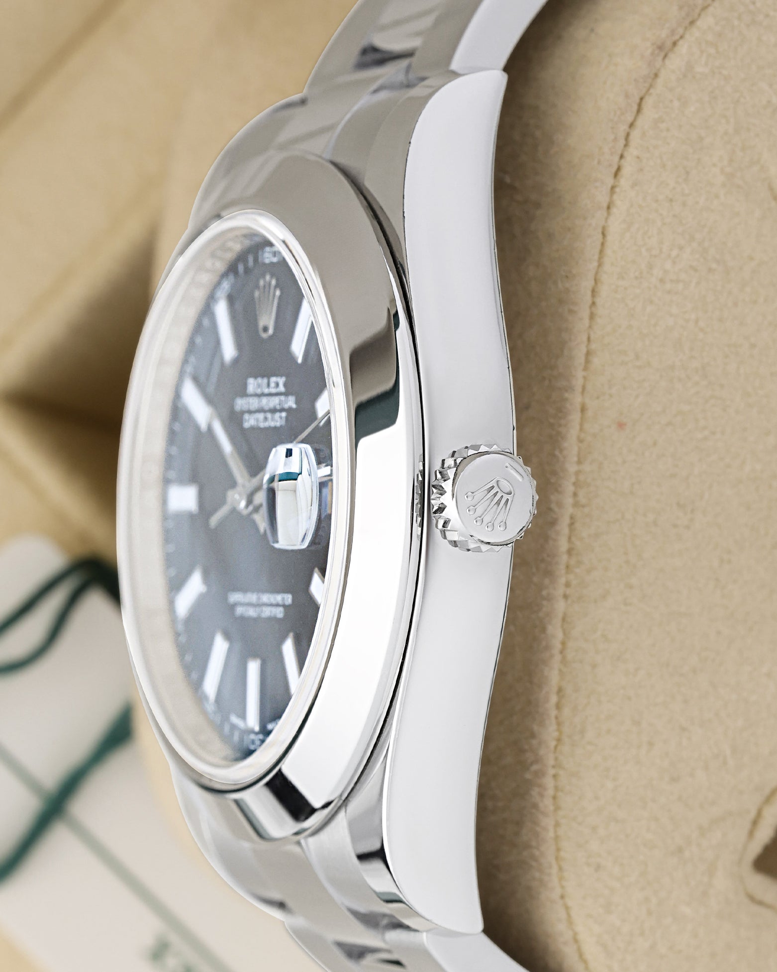 stainless steel 41mm case profile view showcasing the smooth bezel edge and Twinlock winding crown on a Rolex Datejust II