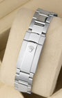 Rear view of the stainless steel three-link Oyster bracelet showing the folding Oysterclasp deployment mechanism with the embossed Rolex crown coronet logo
