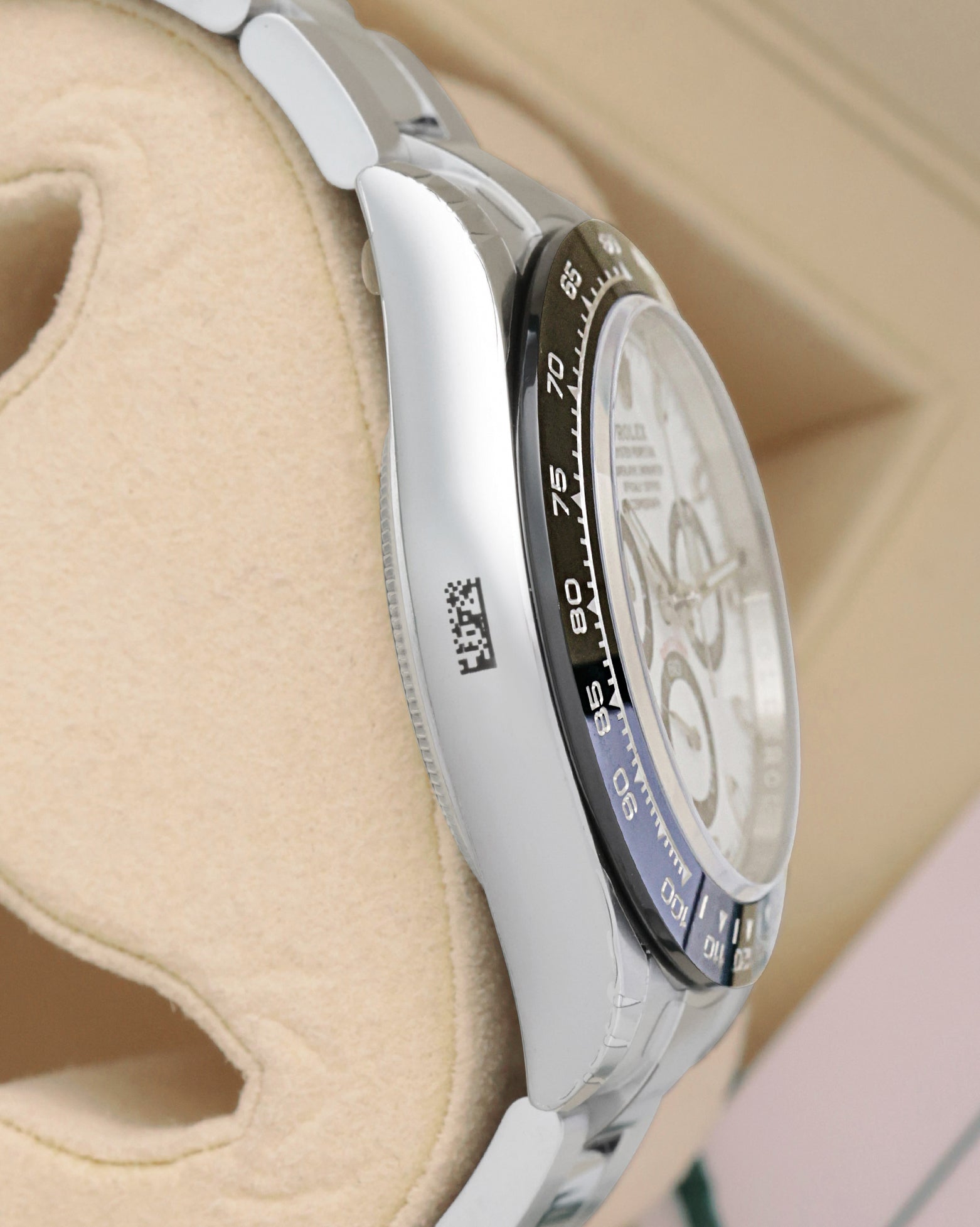 Side profile view of the 40mm Oystersteel case for pre-owned 2022 Rolex Cosmograph Daytona 116500LN