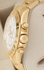Side profile view of the 18k gold case showing the tachymeter bezel scale Triplock crown and threaded screw-down chronograph pushers