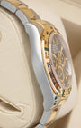 Polished Oystersteel case side view of Rolex Cosmograph Daytona 126503 pre-owned luxury watch.