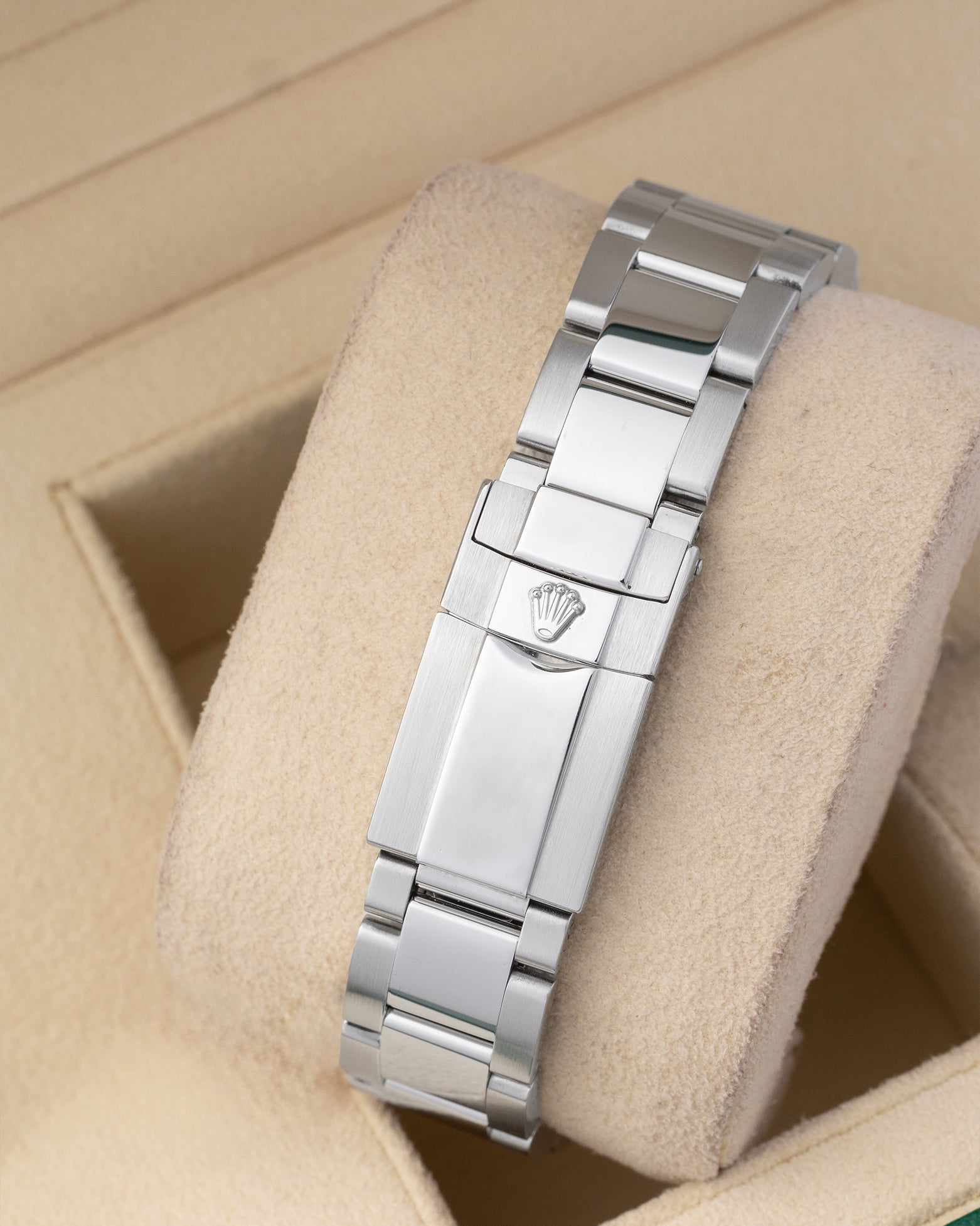 Rear view of the stainless steel Oyster bracelet showing the folding Oysterlock safety clasp with the embossed Rolex crown coronet logo