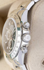 Polished stainless steel case profile view showcasing the screw-down chronograph pushers and Triplock winding crown on a 40mm Rolex Daytona