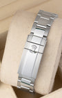 Rear view of the stainless steel Oyster bracelet showing the folding Oysterlock safety clasp with the embossed Rolex crown coronet logo