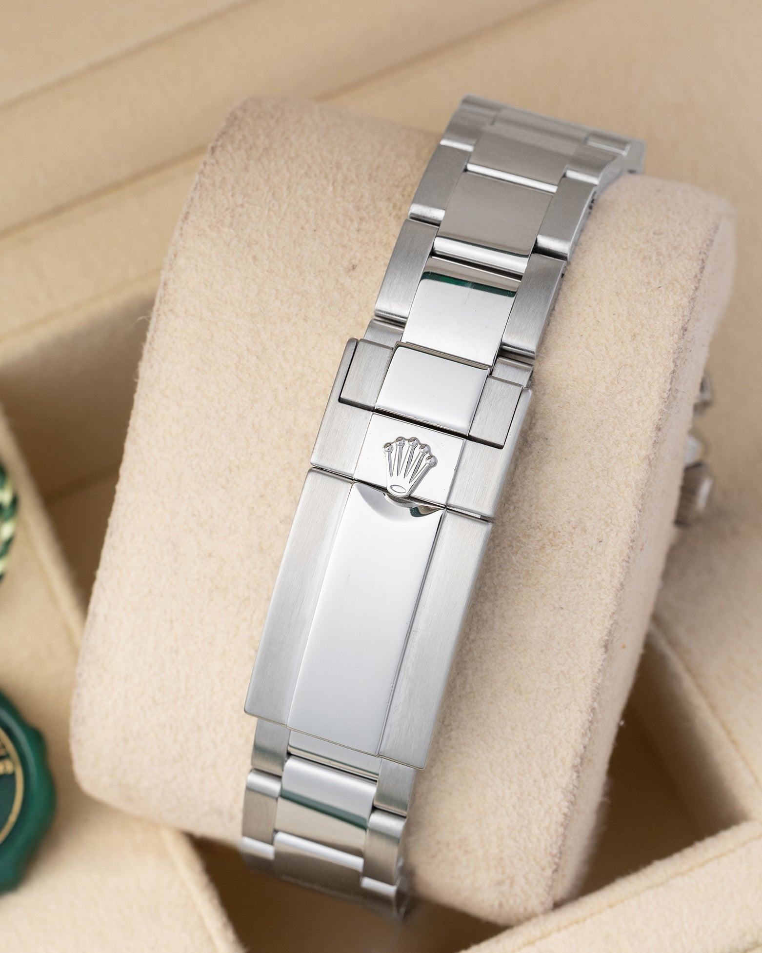 Rear view of the stainless steel Oyster bracelet showing the folding Oysterlock safety clasp with the embossed Rolex crown coronet logo