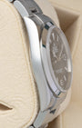 Left side profile view of the polished 36mm stainless steel case on a preowned Rolex Explorer reference 114270