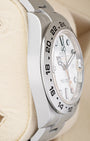 Side profile highlighting the sunray brushed 24-hour fixed bezel and Oystersteel case on reference 216570