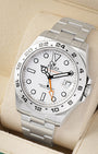 Angled view of Rolex Explorer II 216570 showing the white dial and signature orange GMT 24-hour hand